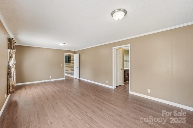 1069 Heather Glen Dr, Catawba, NC 28609 - spare room with crown molding, wood finished floors, and a textured ceiling