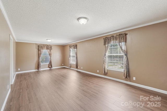 1069 Heather Glen Dr, Catawba, NC 28609 - empty room featuring ornamental molding, a textured ceiling, and wood finished floors