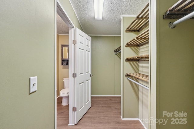 1069 Heather Glen Dr, Catawba, NC 28609 - walk in closet featuring wood finished floors