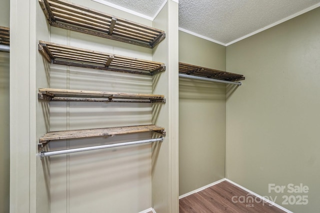 1069 Heather Glen Dr, Catawba, NC 28609 - walk in closet featuring wood finished floors