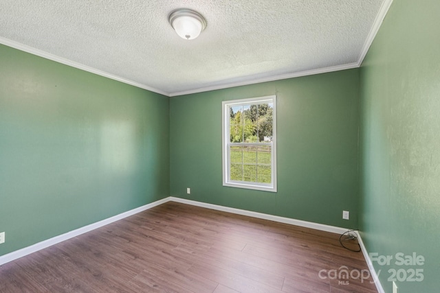 1069 Heather Glen Dr, Catawba, NC 28609 - empty room featuring a textured ceiling, wood finished floors, and ornamental molding