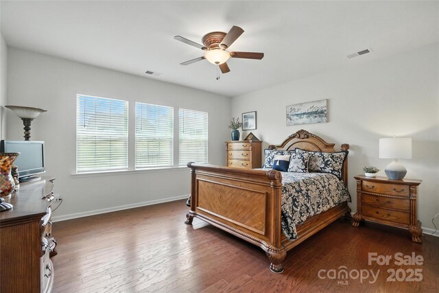 10120 Berkeley Castle Dr, Charlotte, NC 28273 - bedroom with dark wood-style flooring and a ceiling fan