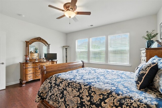 10120 Berkeley Castle Dr, Charlotte, NC 28273 - bedroom with dark wood finished floors and ceiling fan