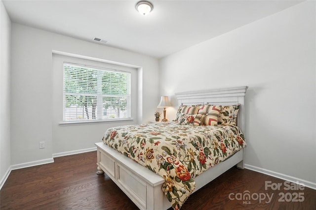 10120 Berkeley Castle Dr, Charlotte, NC 28273 - bedroom featuring dark wood finished floors