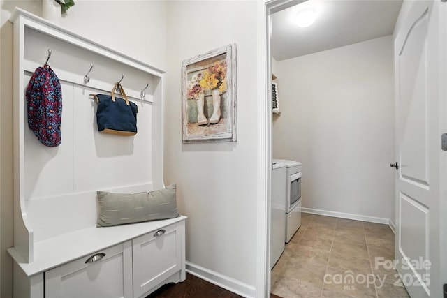 10120 Berkeley Castle Dr, Charlotte, NC 28273 - mudroom featuring washing machine and clothes dryer and baseboards