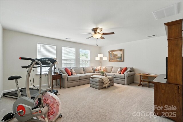 10120 Berkeley Castle Dr, Charlotte, NC 28273 - carpeted living room featuring a ceiling fan and baseboards