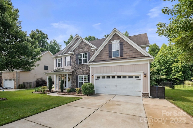137 Branchview Dr, Mooresville, NC 28115 - craftsman inspired home featuring stone siding, concrete driveway, an attached garage, and board and batten siding