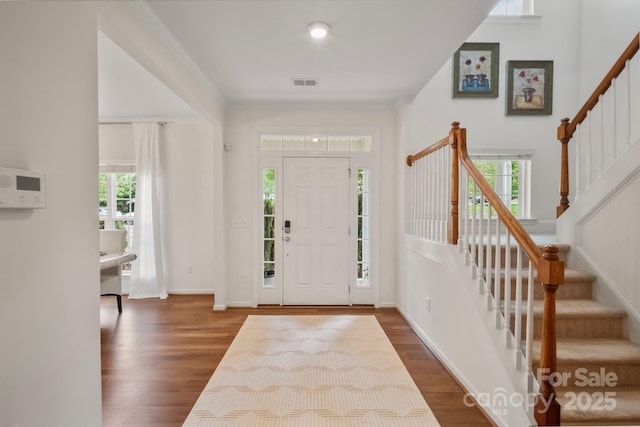137 Branchview Dr, Mooresville, NC 28115 - entrance foyer featuring stairs, healthy amount of natural light, and wood finished floors
