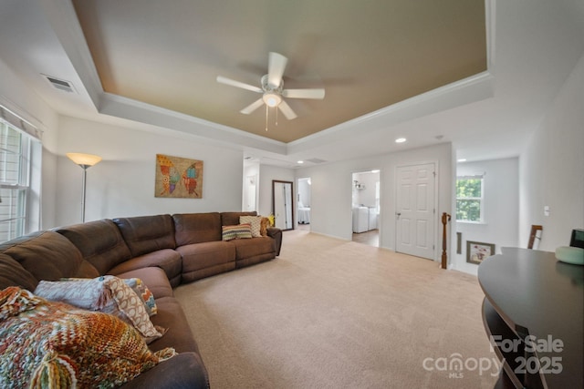 137 Branchview Dr, Mooresville, NC 28115 - living area featuring a tray ceiling, carpet, a ceiling fan, crown molding, and recessed lighting