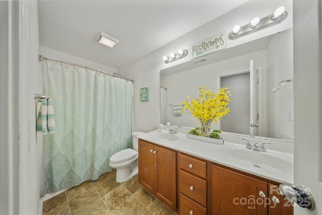 137 Branchview Dr, Mooresville, NC 28115 - bathroom featuring double vanity and a shower with curtain