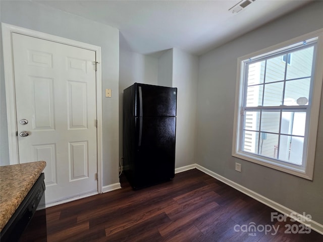 7315 Fig Ln, Charlotte, NC 28215 - kitchen featuring black appliances and dark wood finished floors