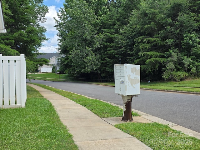 7315 Fig Ln, Charlotte, NC 28215 - view of asphalt road with sidewalks and curbs