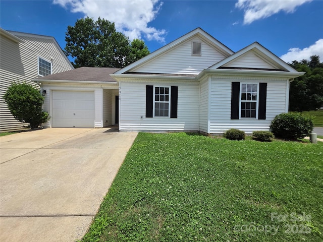 7315 Fig Ln, Charlotte, NC 28215 - view of front of house featuring a garage, driveway, and a front lawn