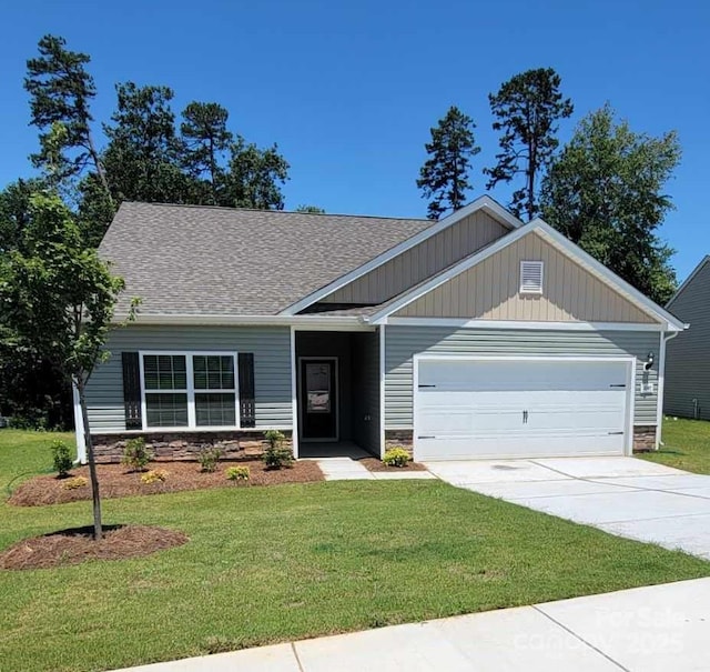 1047 Russell Dr, Winston Salem, NC 27127 - craftsman house featuring stone siding, an attached garage, driveway, a front yard, and roof with shingles