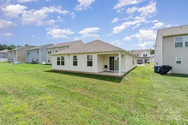 418 Winsley Dr, Salisbury, NC 28147 - back of house featuring a patio area, a yard, and a residential view