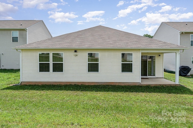 418 Winsley Dr, Salisbury, NC 28147 - back of house featuring a patio, a lawn, and a shingled roof