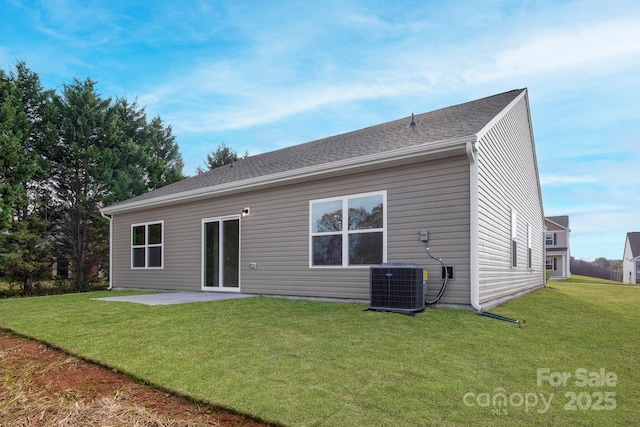 1060 Russell Dr, Winston Salem, NC 27127 - rear view of house with a patio and a lawn