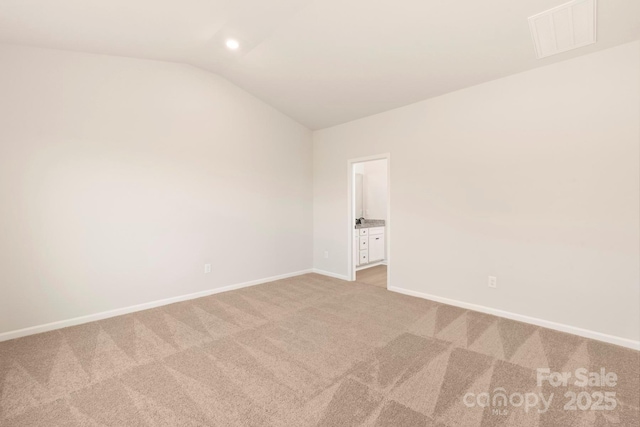 1060 Russell Dr, Winston Salem, NC 27127 - empty room with light carpet and lofted ceiling