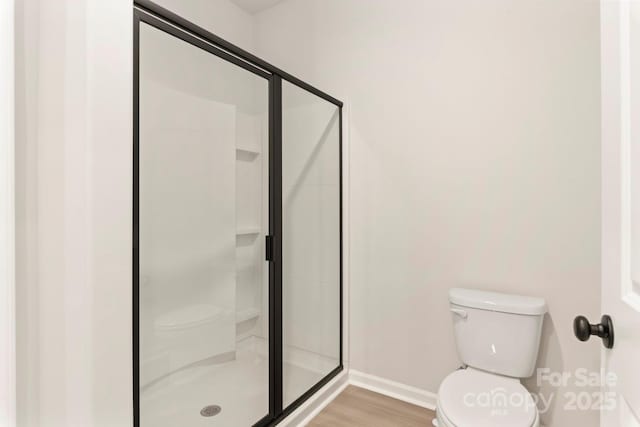 1060 Russell Dr, Winston Salem, NC 27127 - full bathroom featuring a shower stall and wood finished floors