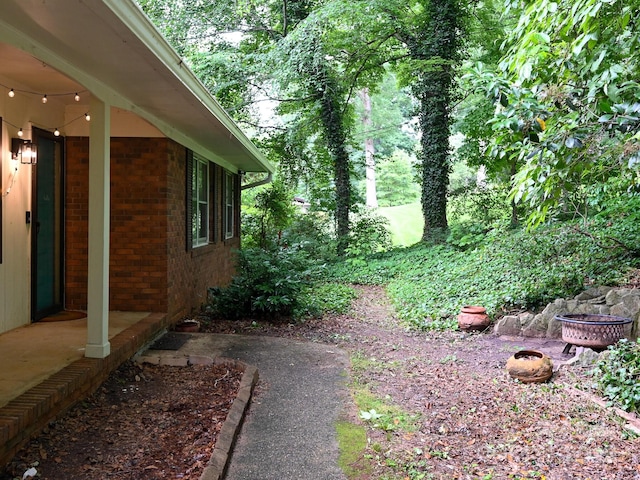 8 Mayfair Dr, Candler, NC 28715 - view of yard featuring a fire pit