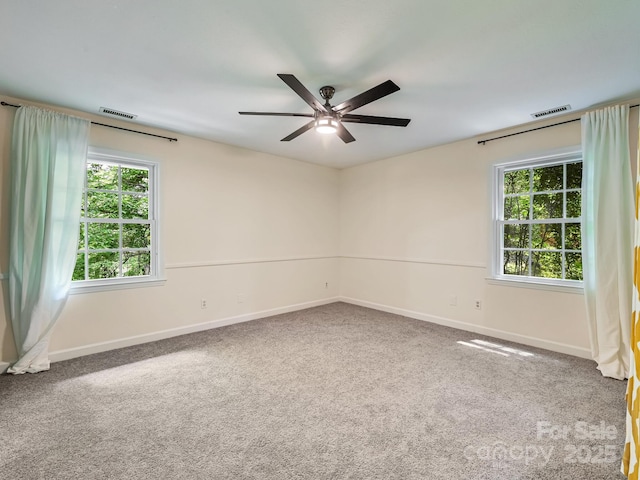 8 Mayfair Dr, Candler, NC 28715 - unfurnished room with ceiling fan, healthy amount of natural light, and carpet
