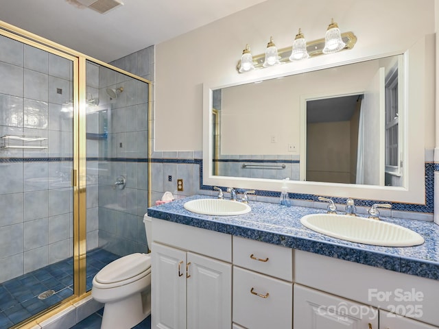 8 Mayfair Dr, Candler, NC 28715 - full bath featuring double vanity, a shower stall, tile walls, and tile patterned flooring