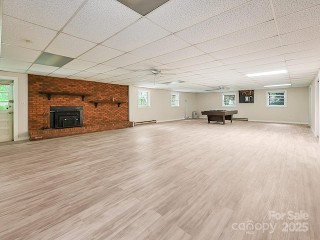 8 Mayfair Dr, Candler, NC 28715 - basement with a paneled ceiling, billiards table, light wood-style flooring, plenty of natural light, and ceiling fan