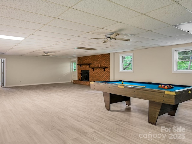 8 Mayfair Dr, Candler, NC 28715 - playroom with plenty of natural light, wood finished floors, a ceiling fan, and a paneled ceiling