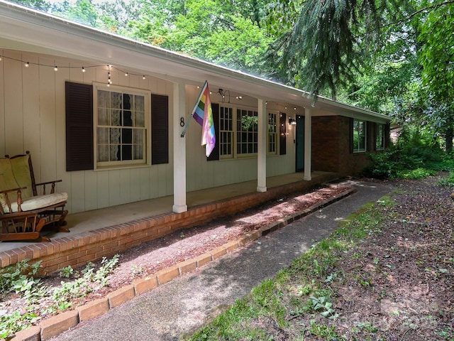 8 Mayfair Dr, Candler, NC 28715 - doorway to property with covered porch