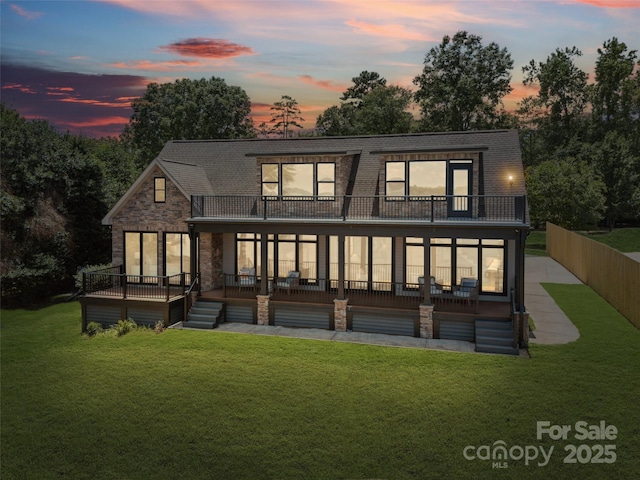 5985 Natoma Rd, Clover, SC 29710 - back of house featuring a balcony, a wooden deck, and stone siding