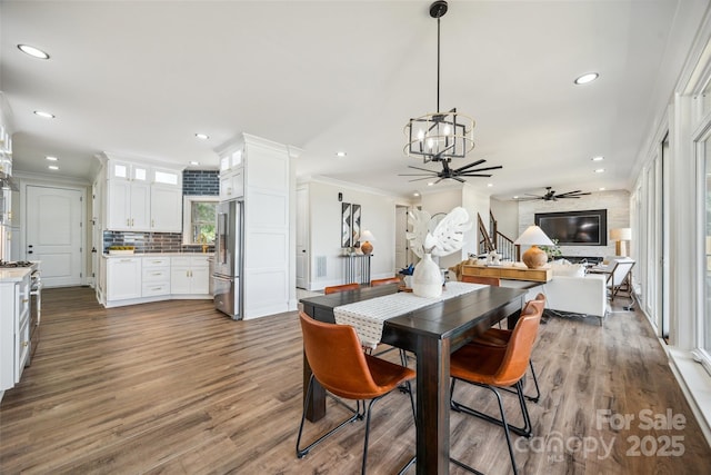 5985 Natoma Rd, Clover, SC 29710 - dining room featuring recessed lighting, ornamental molding, a chandelier, wood finished floors, and ceiling fan