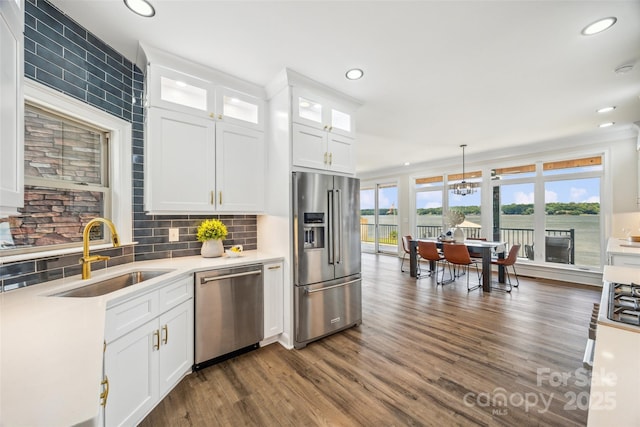 5985 Natoma Rd, Clover, SC 29710 - kitchen with stainless steel appliances, recessed lighting, dark wood finished floors, tasteful backsplash, and light countertops
