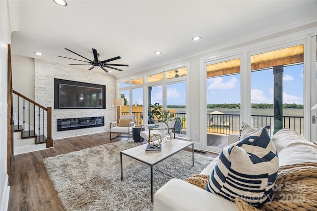 5985 Natoma Rd, Clover, SC 29710 - living room featuring ceiling fan, healthy amount of natural light, recessed lighting, wood finished floors, and stairway