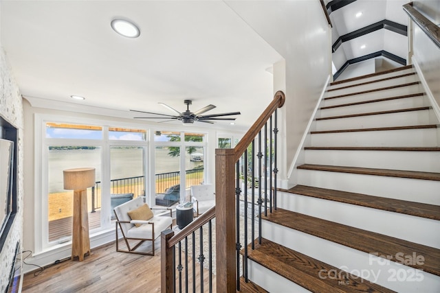 5985 Natoma Rd, Clover, SC 29710 - staircase featuring ceiling fan, wood finished floors, recessed lighting, and a water view