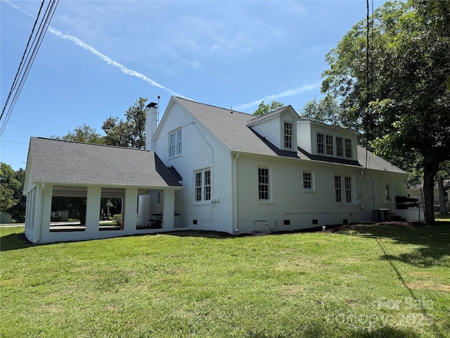 309 E Main St, Lattimore, NC 28089 - rear view of property with crawl space, a chimney, a yard, and a shingled roof