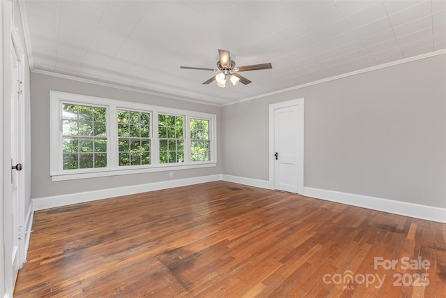 309 E Main St, Lattimore, NC 28089 - empty room with crown molding, ceiling fan, and hardwood / wood-style flooring