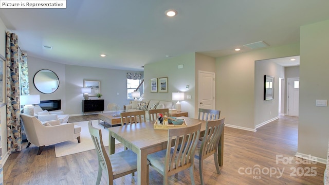 1400 Secrest Commons Dr, Monroe, NC 28112 - dining area with wood finished floors and recessed lighting