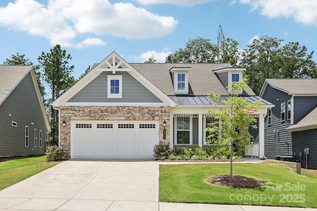 3022 Trace Meadow Ct, York, SC 29745 - view of front of house featuring brick siding, driveway, a front yard, and a standing seam roof