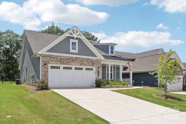 3022 Trace Meadow Ct, York, SC 29745 - craftsman-style home featuring covered porch, concrete driveway, a garage, a shingled roof, and brick siding