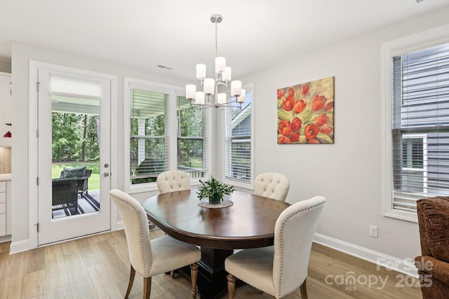 3022 Trace Meadow Ct, York, SC 29745 - dining room with a chandelier and light wood-type flooring