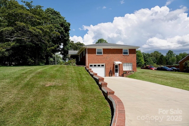 795 Monte Vista Rd, Candler, NC 28715 - view of side of property with driveway, brick siding, a garage, and a lawn