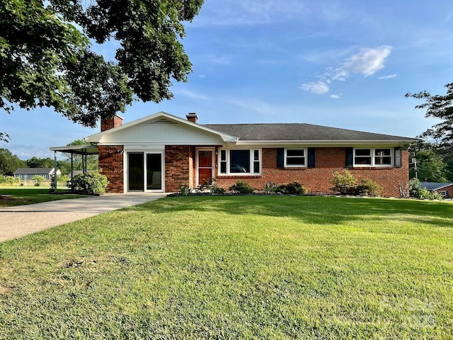 795 Monte Vista Rd, Candler, NC 28715 - single story home with brick siding, a front lawn, a chimney, and concrete driveway