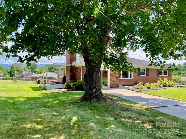 795 Monte Vista Rd, Candler, NC 28715 - ranch-style house with brick siding and a chimney