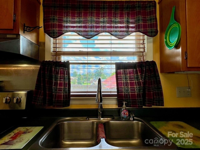 795 Monte Vista Rd, Candler, NC 28715 - kitchen view of a sink and dark countertops