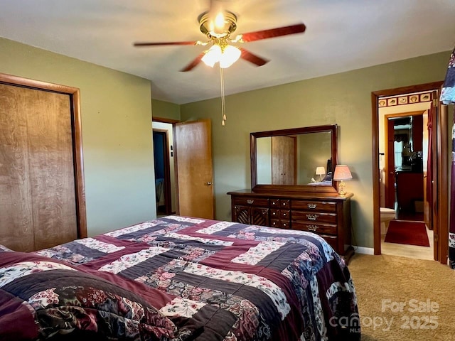 795 Monte Vista Rd, Candler, NC 28715 - carpeted bedroom with a ceiling fan and ensuite bath