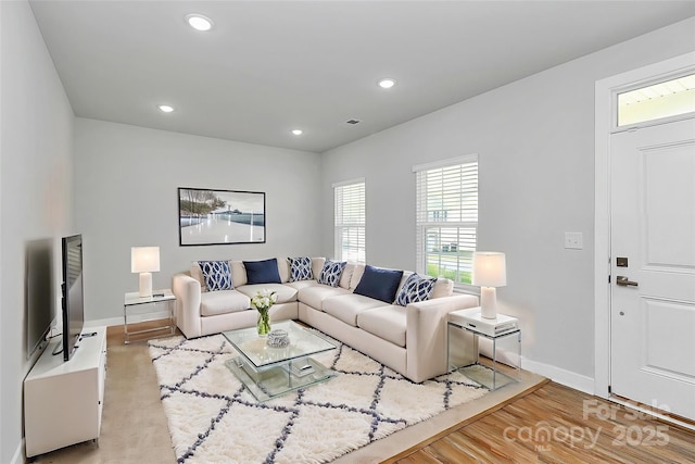 7079 Waterwheel St SW, Concord, NC 28025 - living area featuring recessed lighting and light wood finished floors