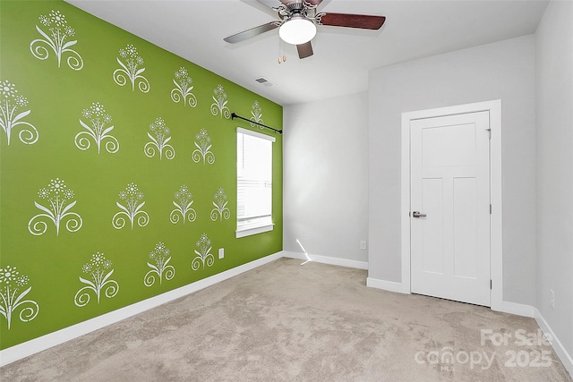 7079 Waterwheel St SW, Concord, NC 28025 - carpeted spare room with baseboards and ceiling fan
