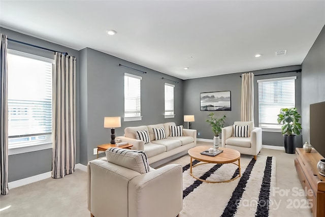 7079 Waterwheel St SW, Concord, NC 28025 - living room featuring light colored carpet and recessed lighting