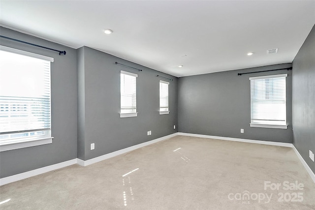7079 Waterwheel St SW, Concord, NC 28025 - empty room with light colored carpet and recessed lighting