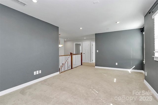 7079 Waterwheel St SW, Concord, NC 28025 - unfurnished room with light colored carpet and recessed lighting